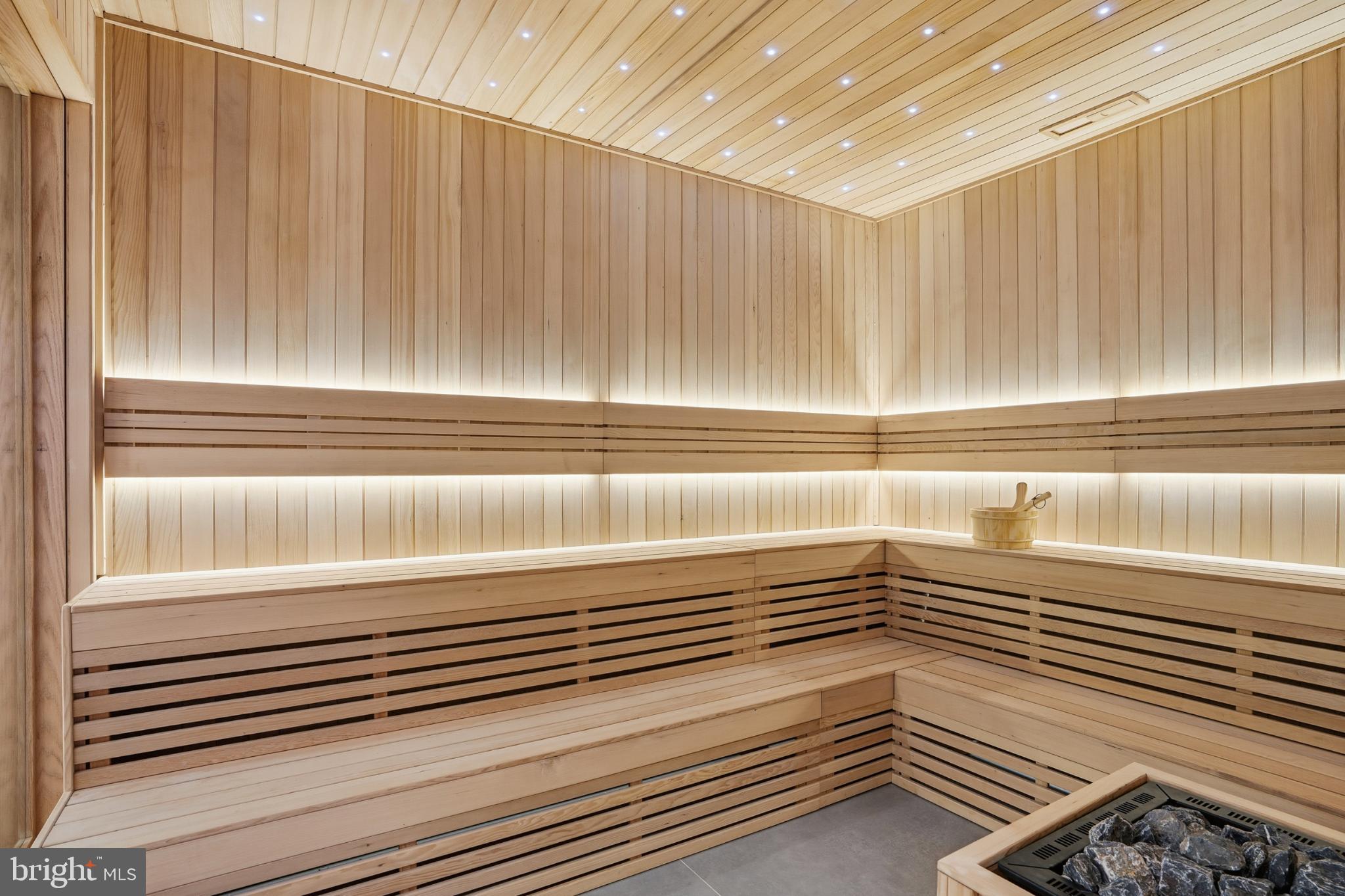 9408 Old Courthouse Road Vienna, VA 22182 - Photo 85 of 92 Serene wooden sauna with ambient lighting.