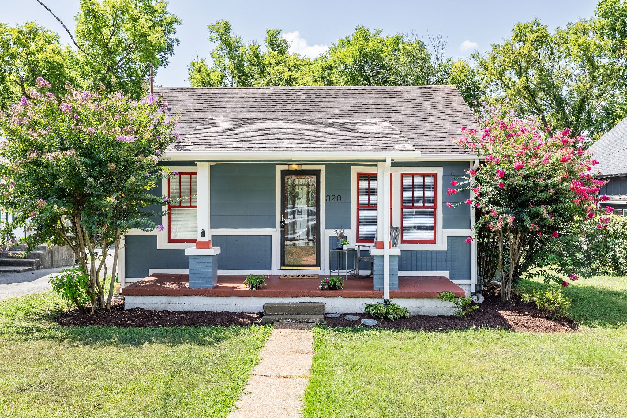 a house view with a garden space