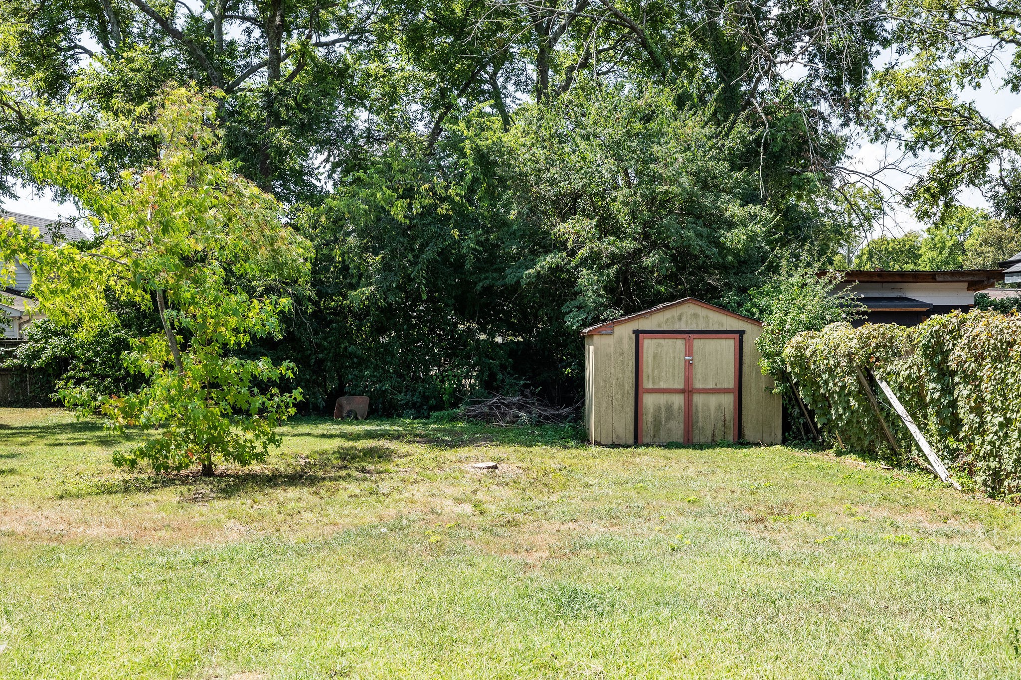 320 Cherry Street Madison, TN 37115 - Photo 26 of 30 a house with trees in front of it