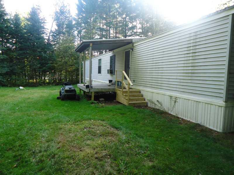 136 Winnecook Road Burnham, ME 04922 - Photo 4 of 25 Exterior Back.