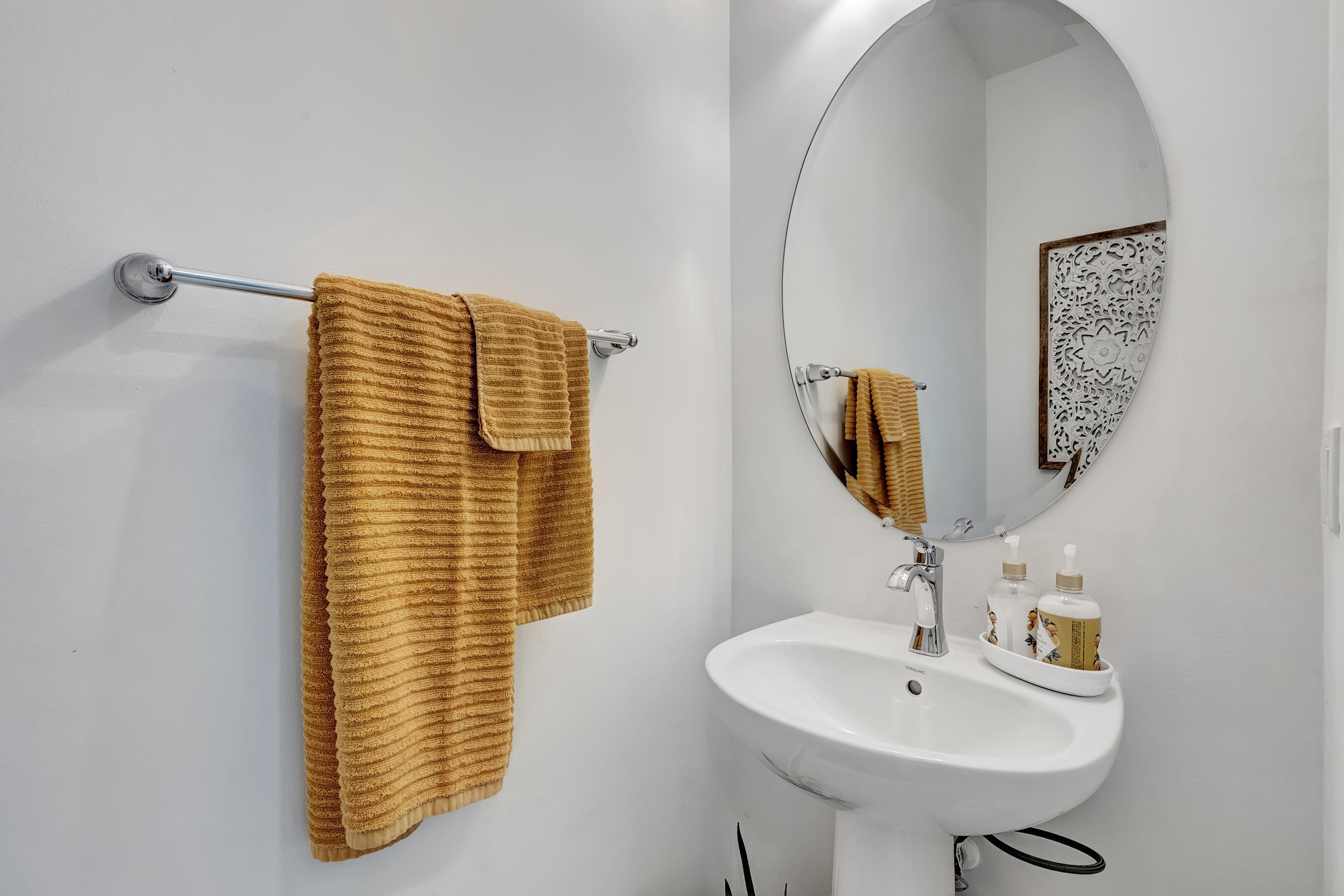 10043 Akenside Drive Boca Raton, FL 33428 - Photo 12 of 30 a bathroom with a sink and a mirror