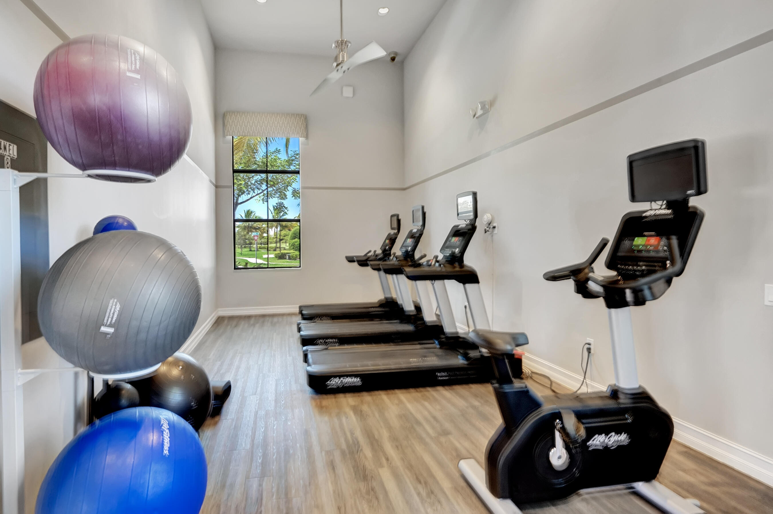 10043 Akenside Drive Boca Raton, FL 33428 - Photo 24 of 30 a living room with furniture and a wooden floor