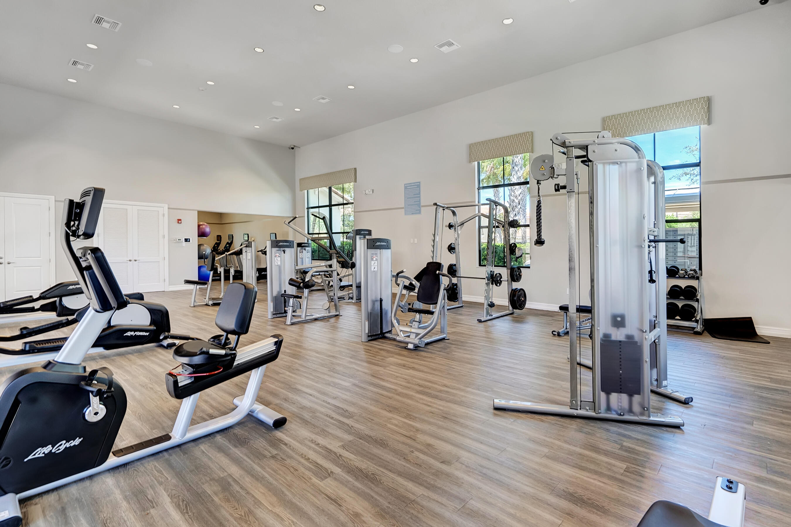 10043 Akenside Drive Boca Raton, FL 33428 - Photo 25 of 30 a view of a room with gym equipment