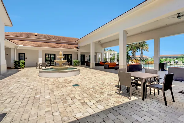a view of a lobby with furniture and rug