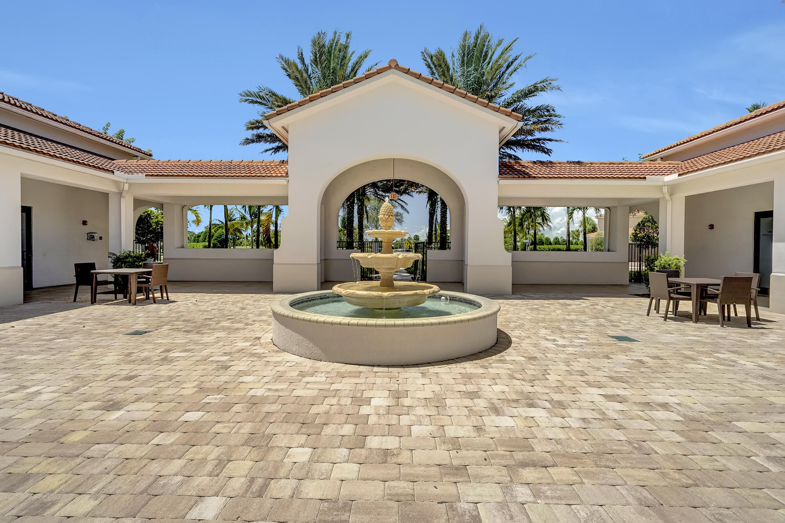 10043 Akenside Drive Boca Raton, FL 33428 - Photo 28 of 30 a view of a house with backyard porch and patio