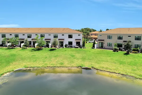 a view of a building with a big yard