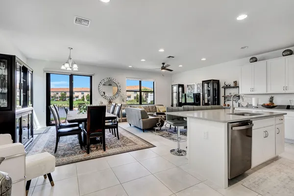 a view of kitchen with sink living room and living room