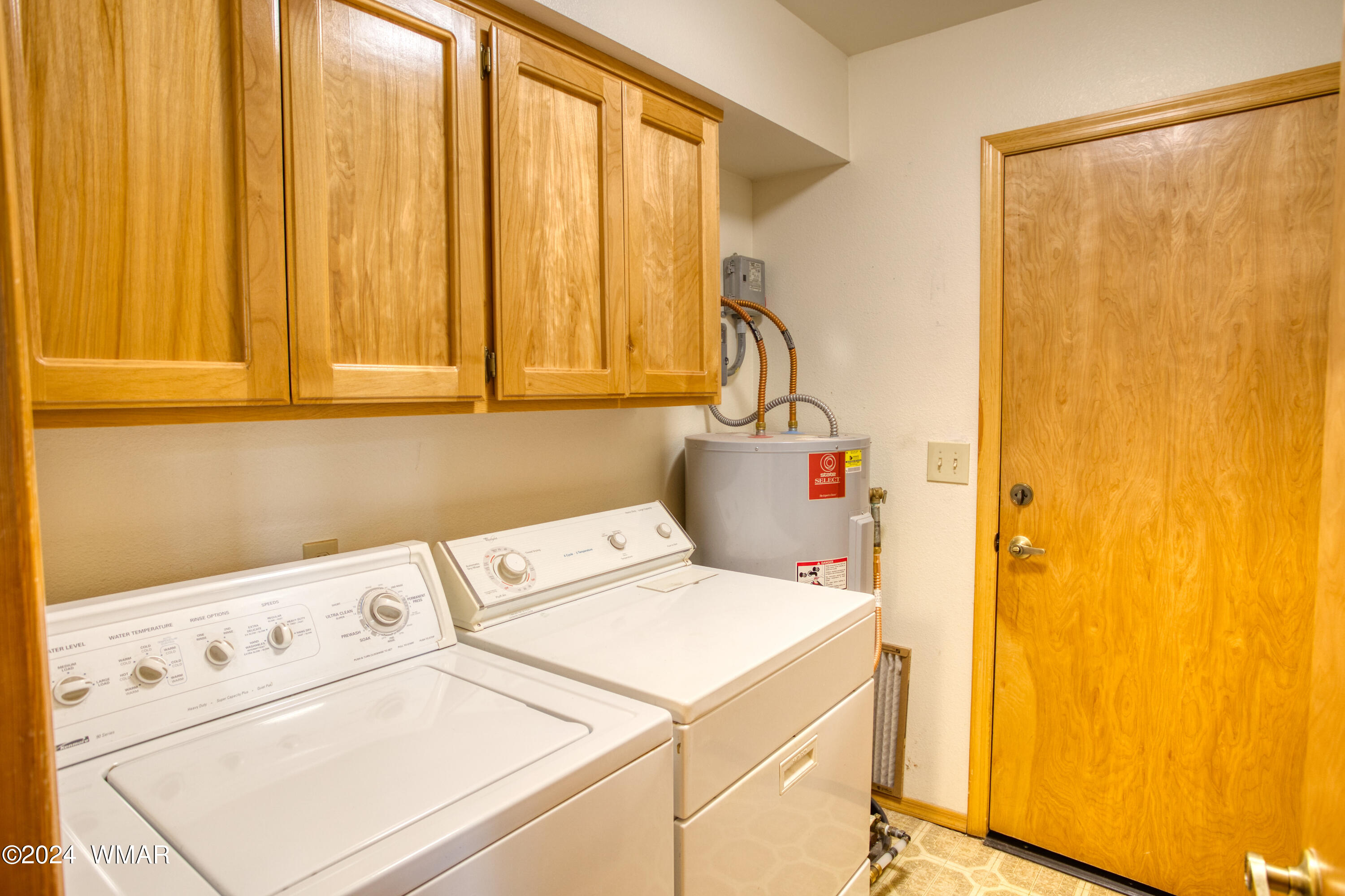 2727 Juniper Circle, Unit 37 Pinetop, AZ 85935 - Photo 12 of 33 a utility room with dryer and washer