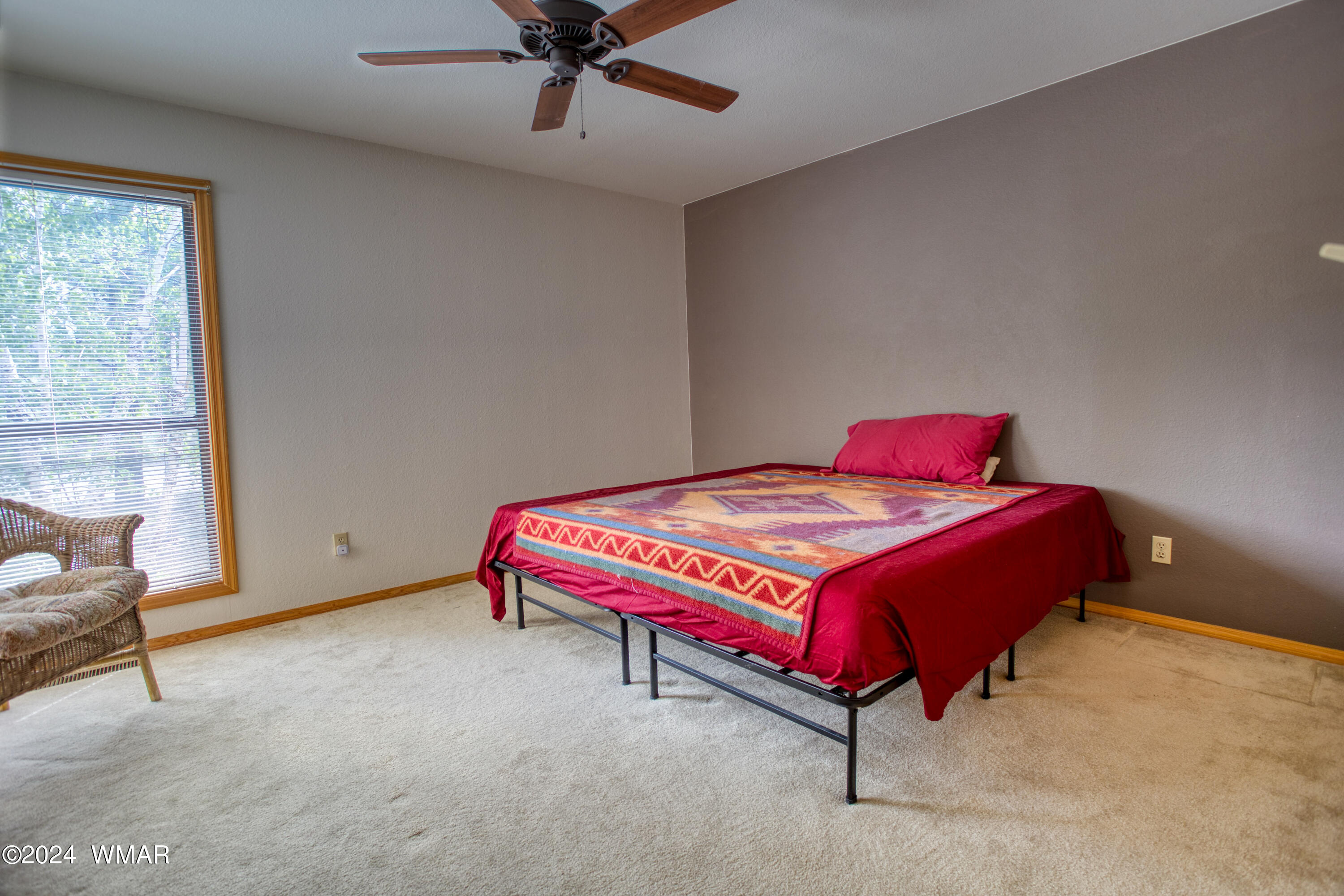 2727 Juniper Circle, Unit 37 Pinetop, AZ 85935 - Photo 14 of 33 a bedroom with a bed and window