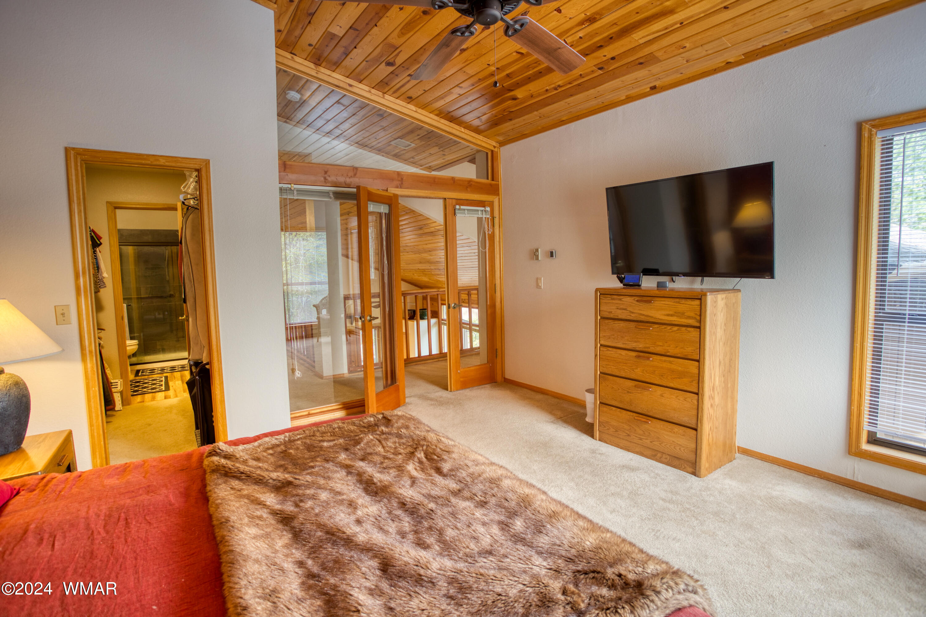2727 Juniper Circle, Unit 37 Pinetop, AZ 85935 - Photo 21 of 33 a bedroom with furniture and flat screen tv
