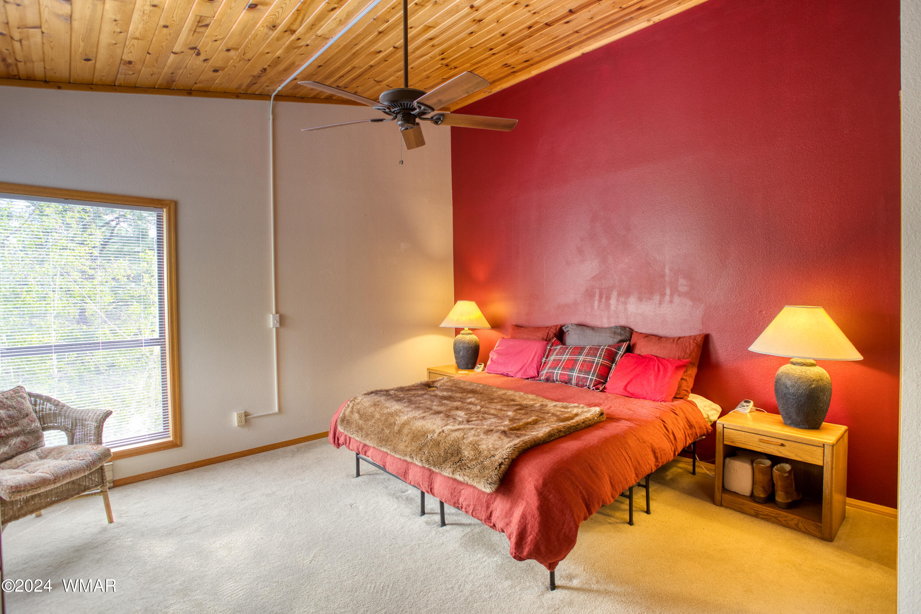 2727 Juniper Circle, Unit 37 Pinetop, AZ 85935 - Photo 22 of 33 a bedroom with a bed and a lamp