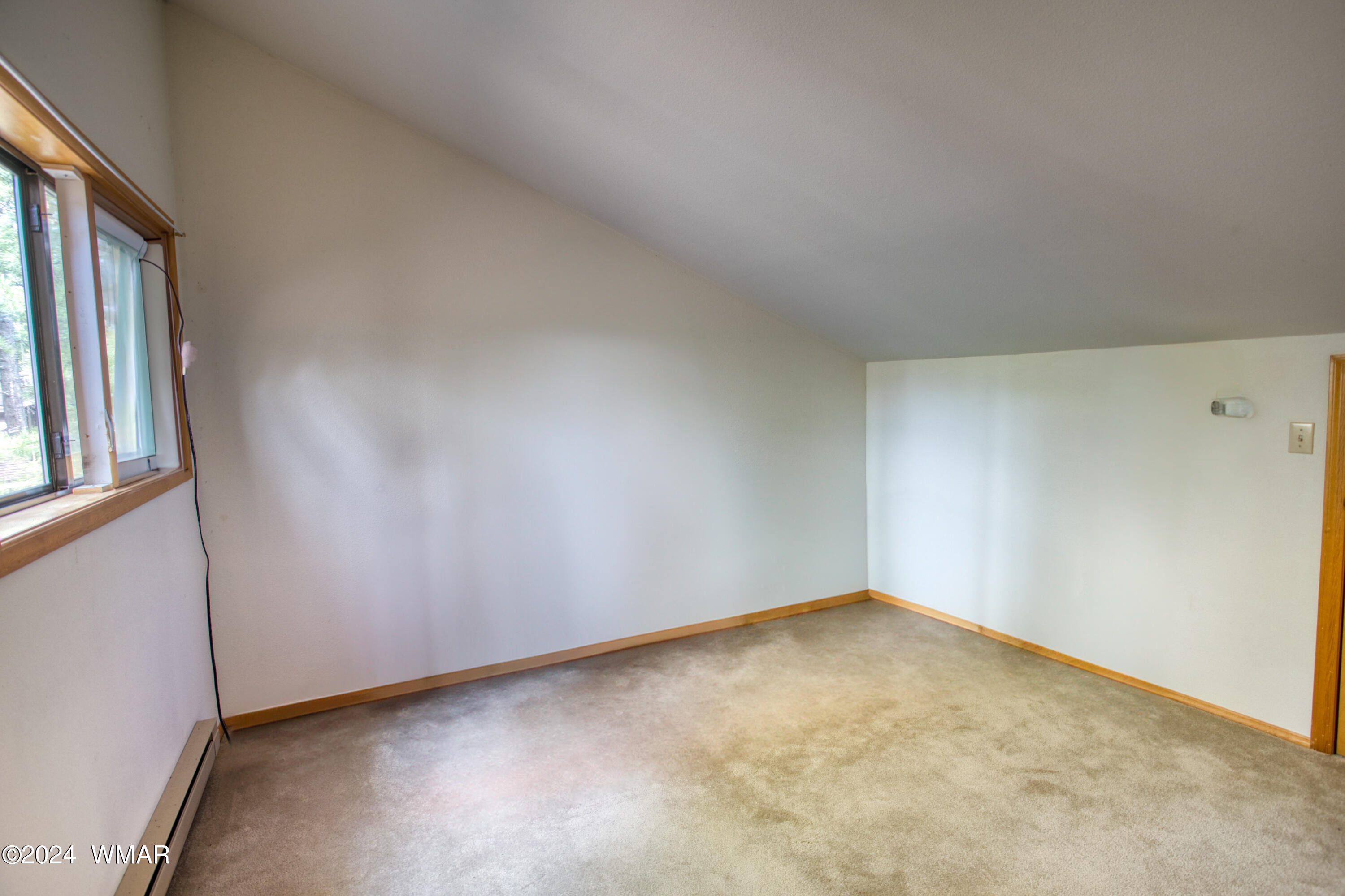2727 Juniper Circle, Unit 37 Pinetop, AZ 85935 - Photo 27 of 33 an empty room with windows