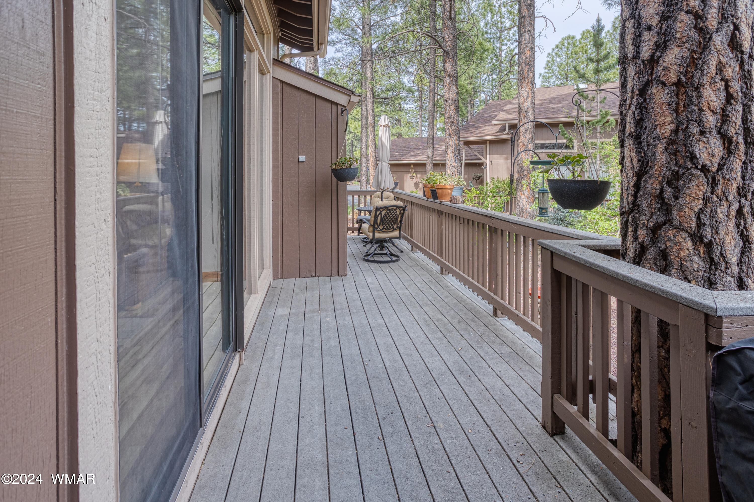 2727 Juniper Circle, Unit 37 Pinetop, AZ 85935 - Photo 30 of 33 a view of balcony with wooden floor and fence