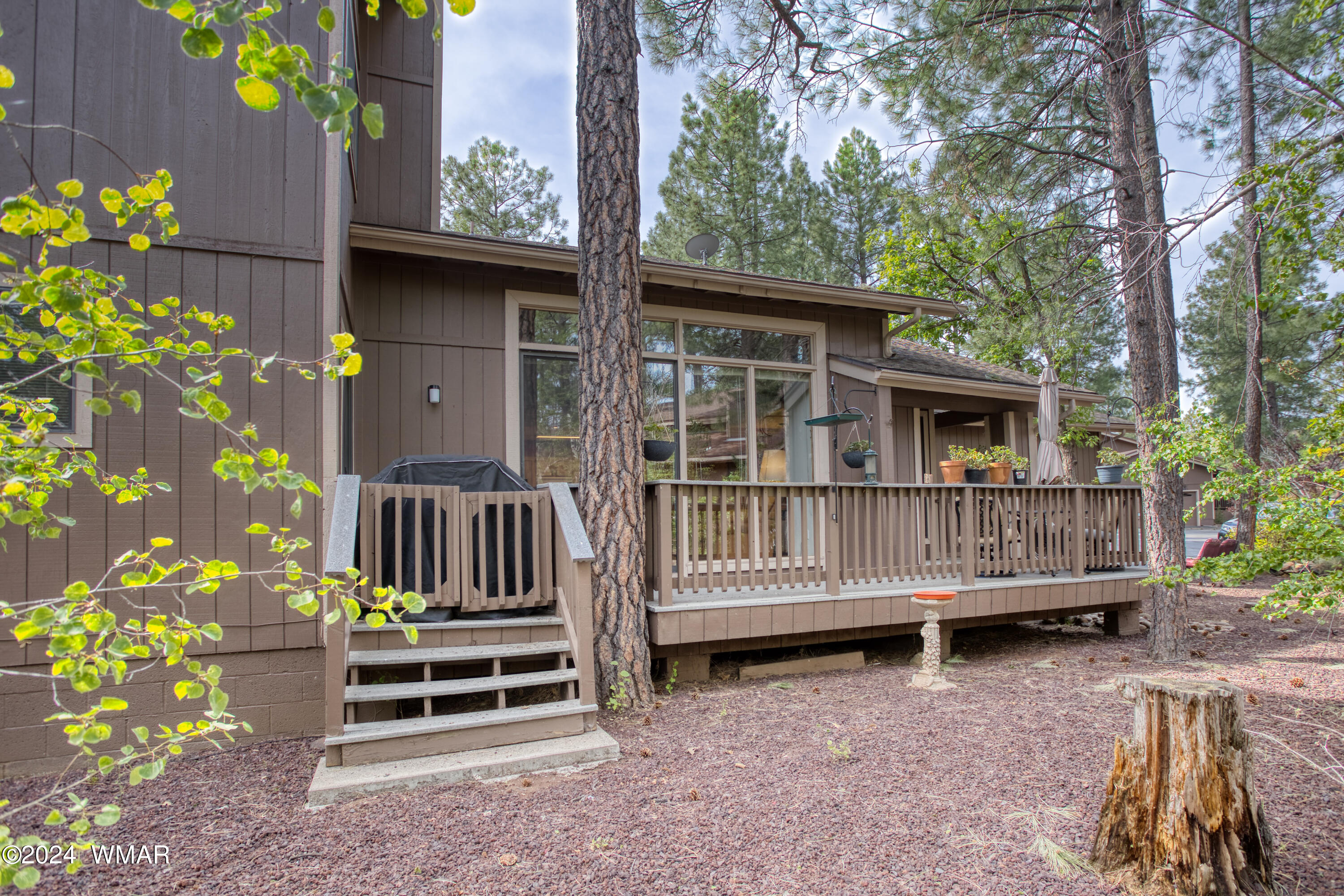 2727 Juniper Circle, Unit 37 Pinetop, AZ 85935 - Photo 3 of 33 a view of a house with a window and wooden fence