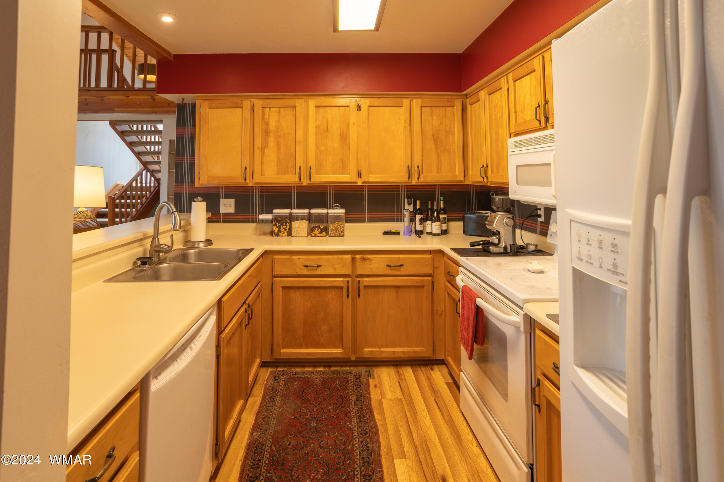 2727 Juniper Circle, Unit 37 Pinetop, AZ 85935 - Photo 10 of 33 a kitchen with a sink stove and cabinets