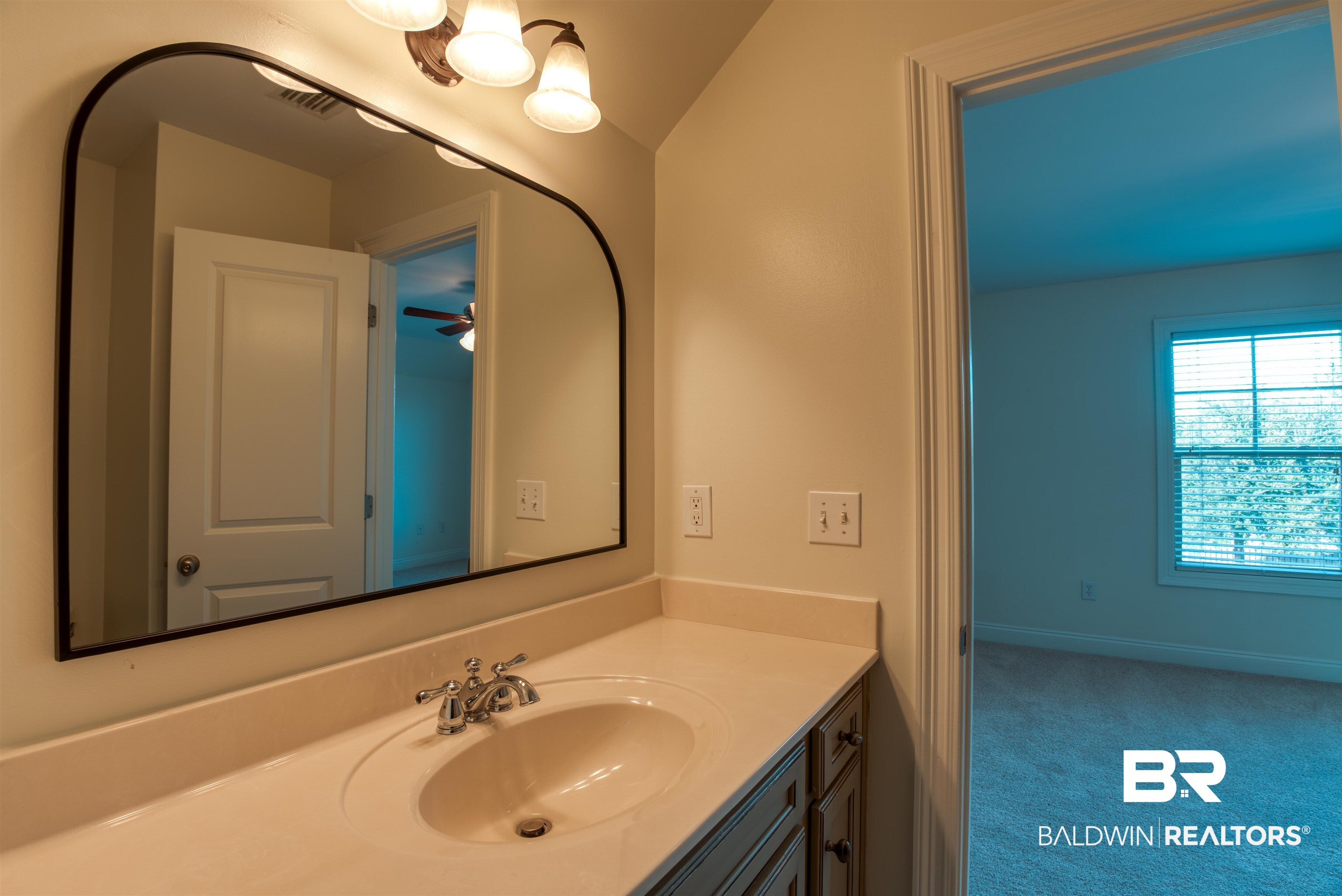 24561 Austin Road Daphne, AL 36526 - Photo 37 of 57 Bathroom with vanity, ceiling fan, and lofted ceiling