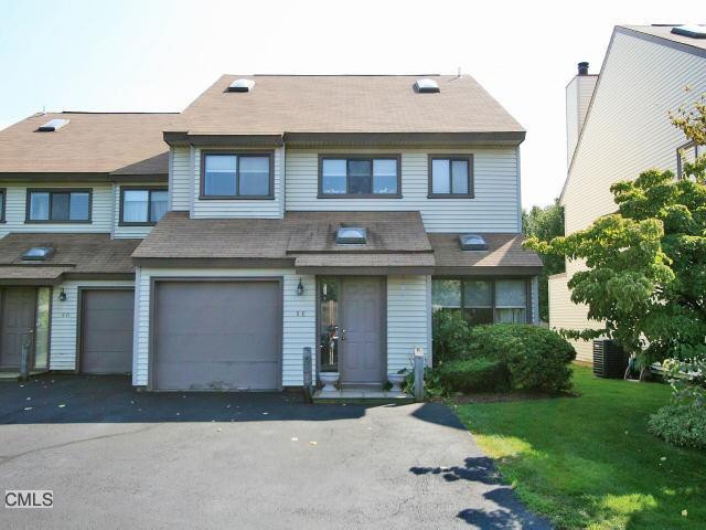 27 Lindstrom Road, Unit 5E Stamford, CT 06902 - Photo 1 of 1 a front view of a house with garden