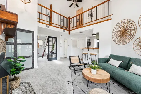 a living room with furniture and a table