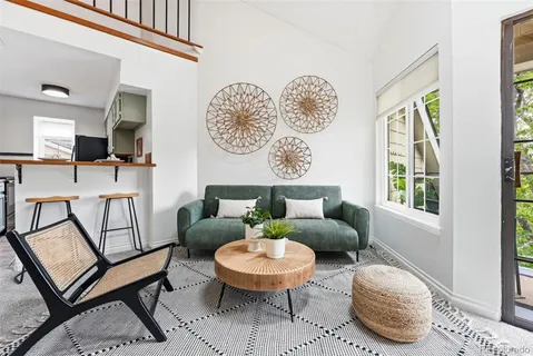 a view of a balcony with furniture