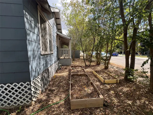 a view of yard along with trees