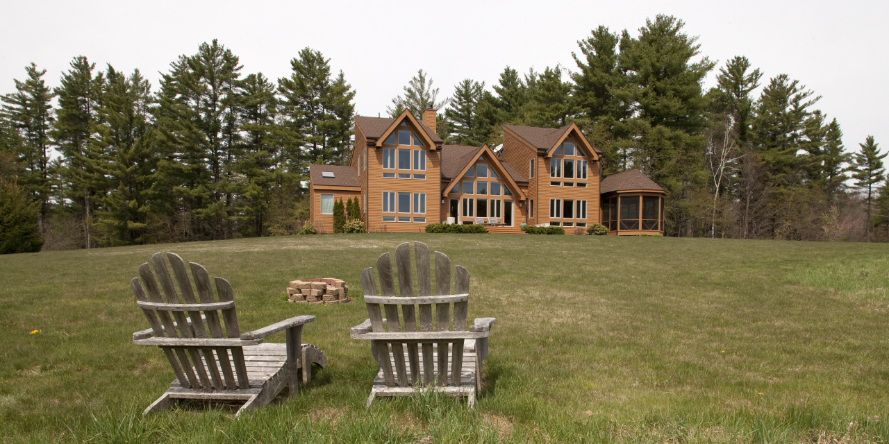72 A Brett Road Monterey, MA 01245 - Photo 3 of 20 a front view of a house with garden