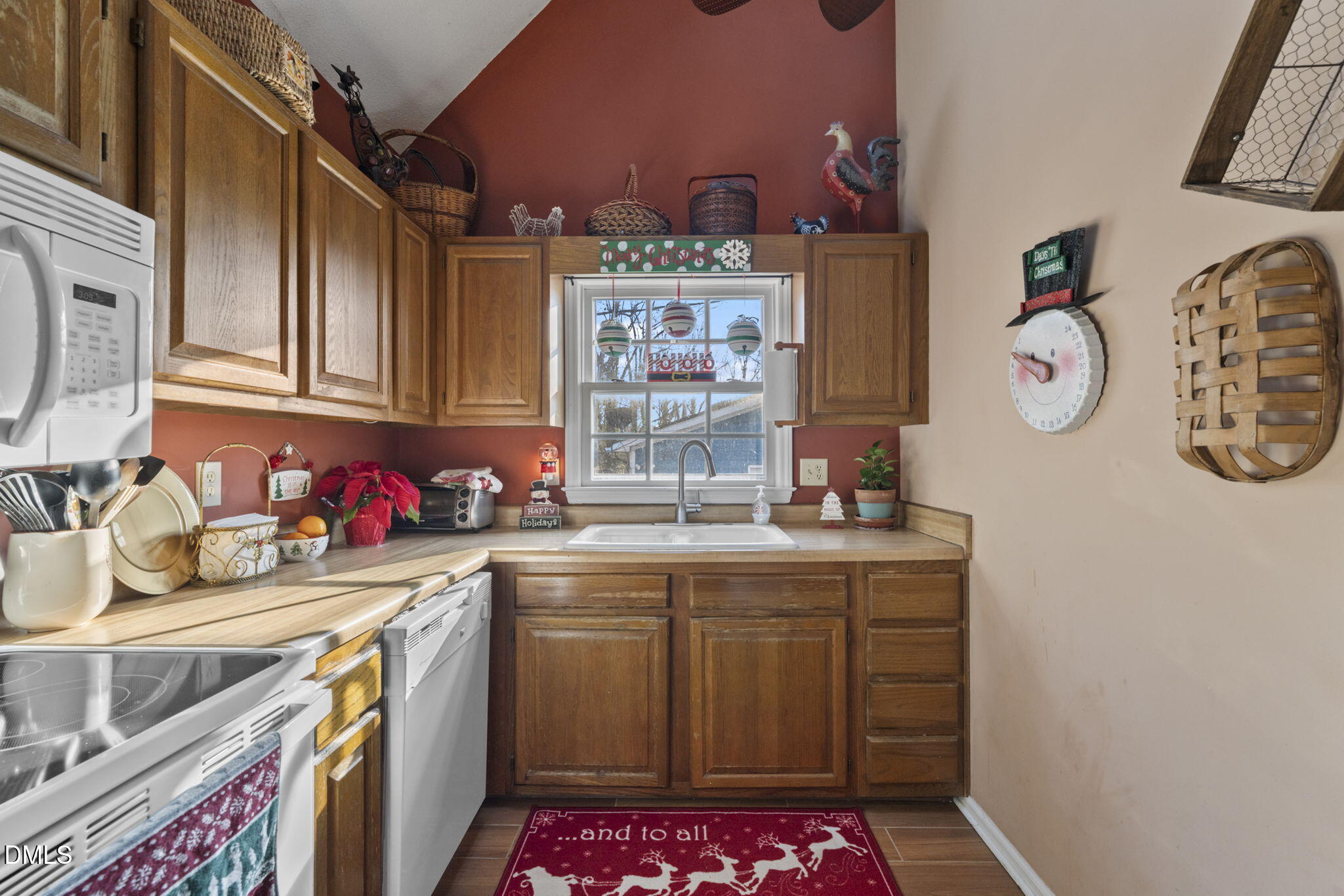 207 South Adams Street Durham, NC 27703 - Photo 15 of 49 a kitchen with a sink and cabinets