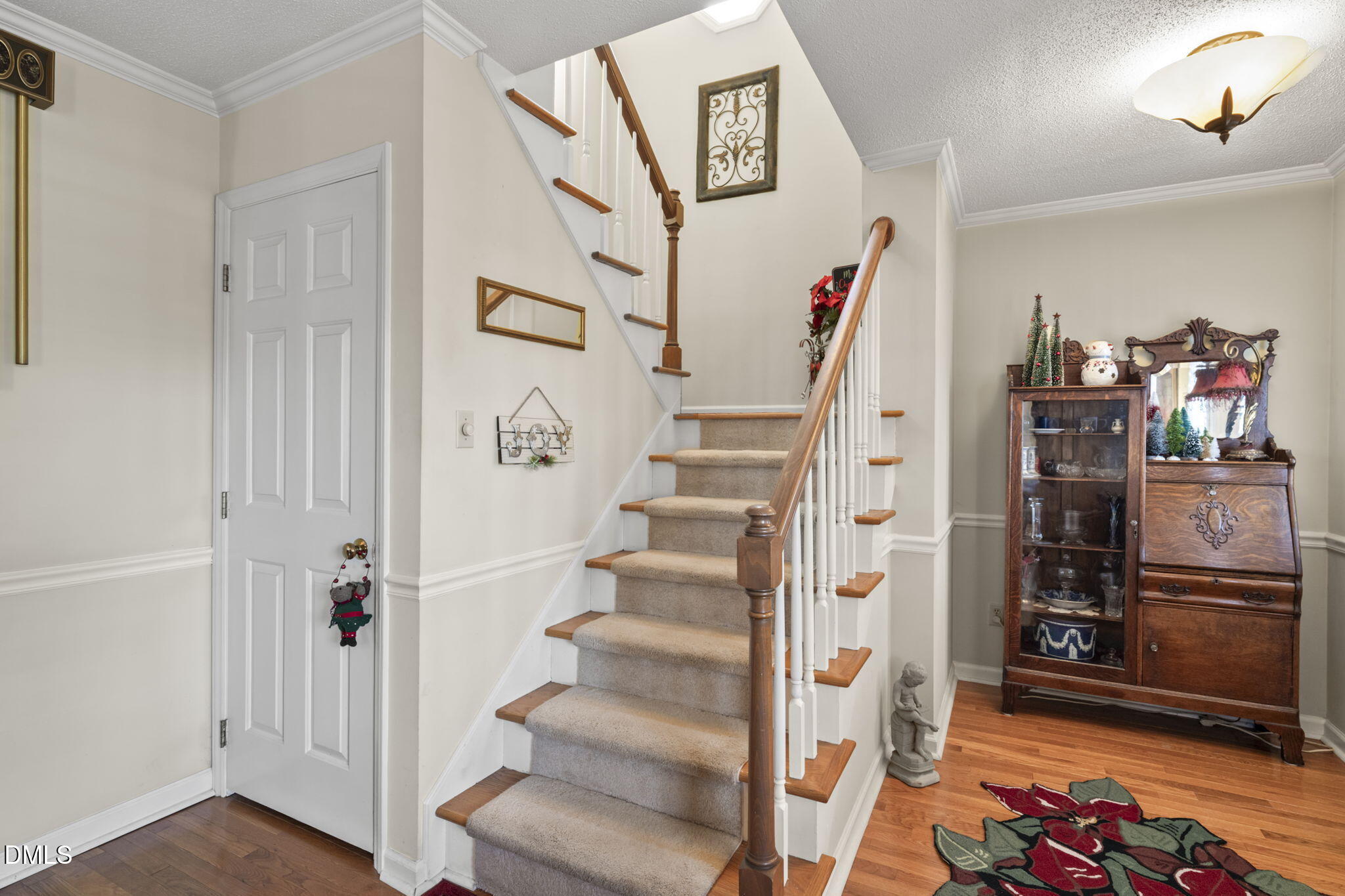207 South Adams Street Durham, NC 27703 - Photo 28 of 49 a view of entryway with furniture and wooden floor