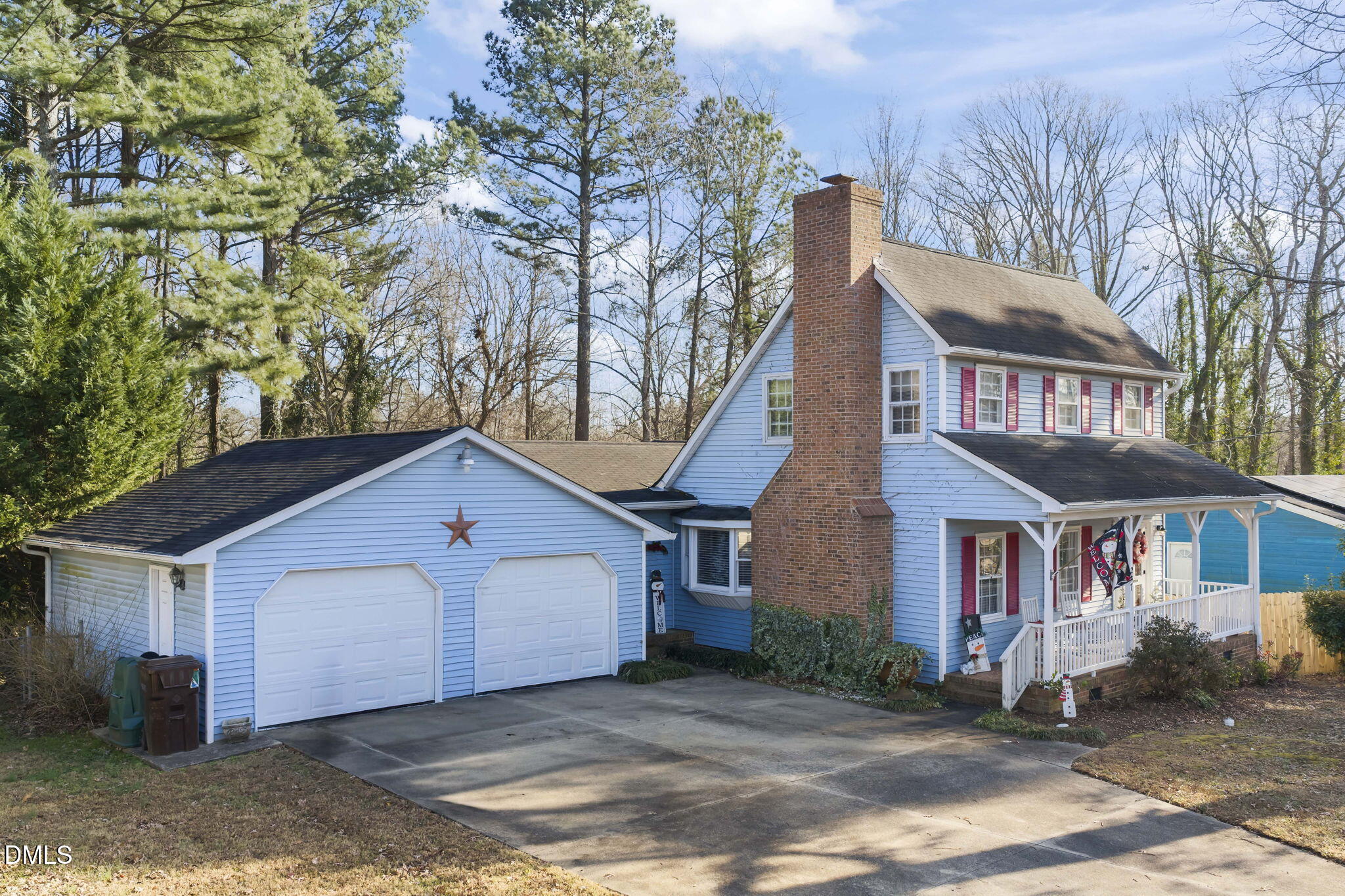 207 South Adams Street Durham, NC 27703 - Photo 31 of 49 a front view of a house with a yard and garage