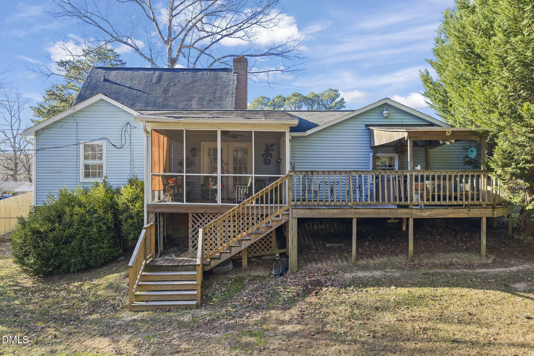207 South Adams Street Durham, NC 27703 - Photo 42 of 49 a view of house with a yard and wooden fence
