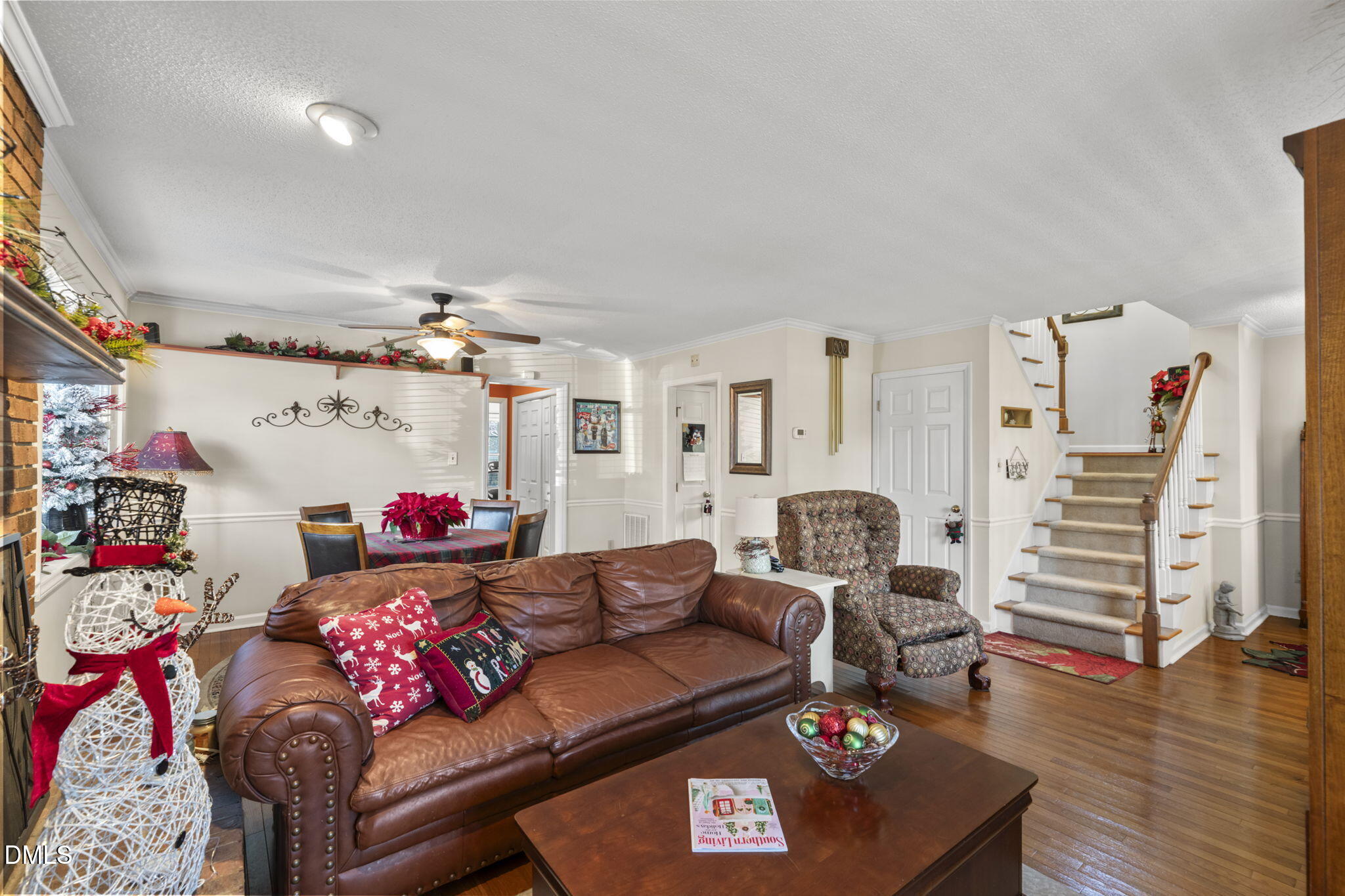 207 South Adams Street Durham, NC 27703 - Photo 10 of 49 a living room with furniture and wooden floor
