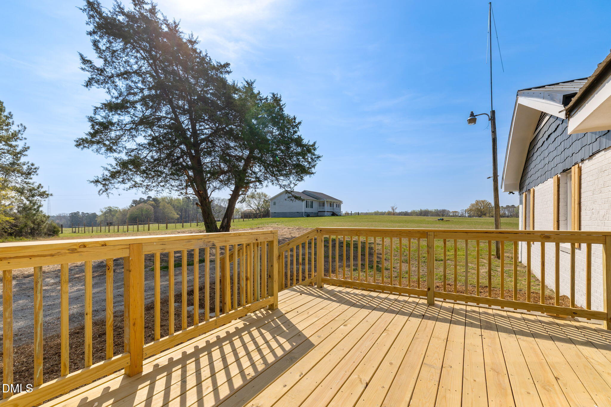 426 Rooker Dairy Road Norlina, NC 27563 - Photo 24 of 33 a view of balcony with wooden floor and fence