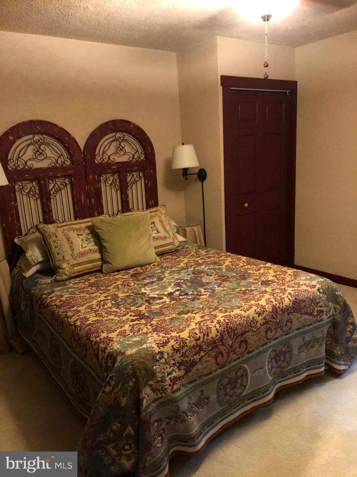 42 Pearl Place Basye, VA 22842 - Photo 16 of 30 a bedroom with a bed and a window