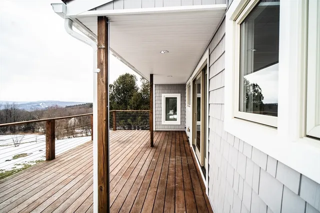 a bathroom with a sink a mirror and a toilet