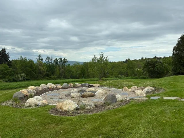 a view of a golf course with a lake