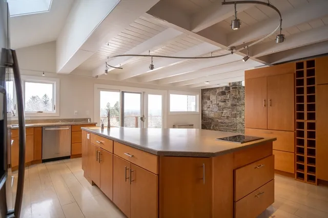 a view of balcony with wooden floor