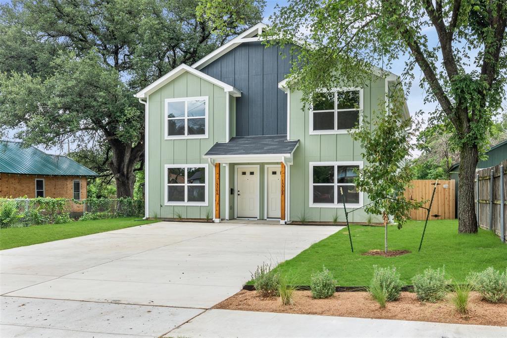 1536 Alexander Avenue, Unit A & B Waco, TX 76708 - Photo 3 of 30 Modern two-story duplex with light green vertical siding and dark blue accents