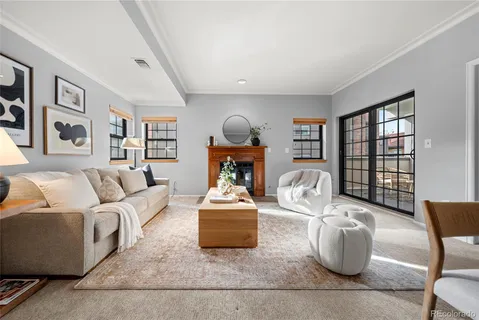 a living room with furniture and a window