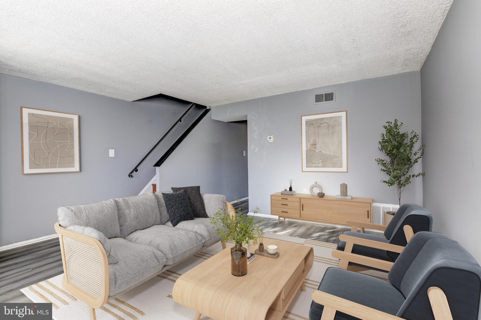 2707 Marbourne Avenue Baltimore, MD 21230 - Photo 3 of 14 a living room with furniture potted plant and a window