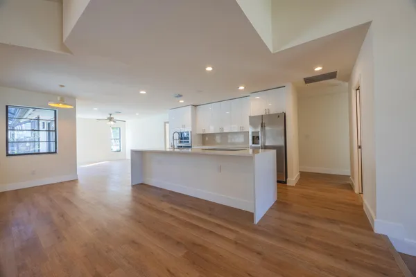 a view of kitchen with wooden floor