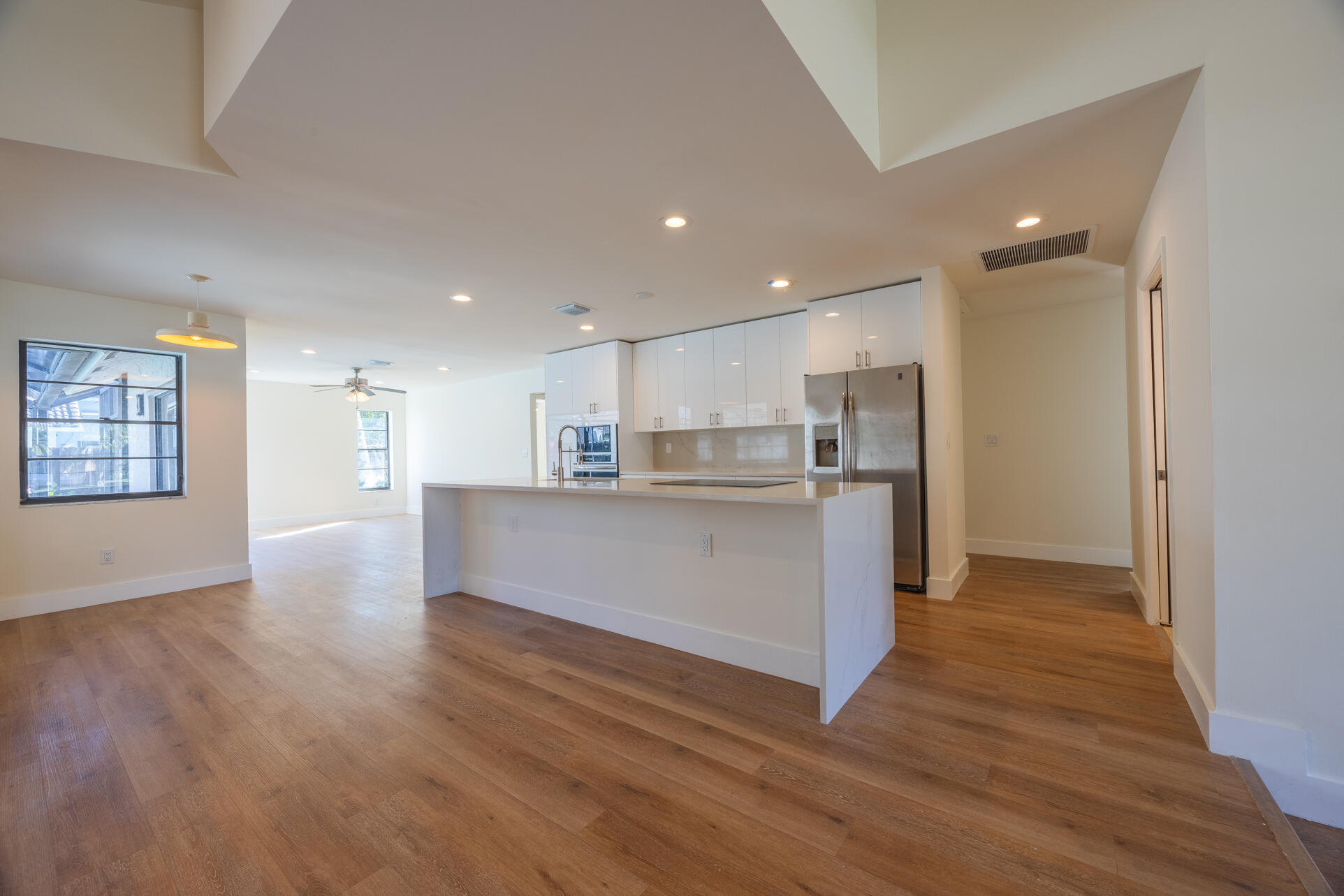 22352 Martella Avenue Boca Raton, FL 33433 - Photo 16 of 26 a view of kitchen with wooden floor