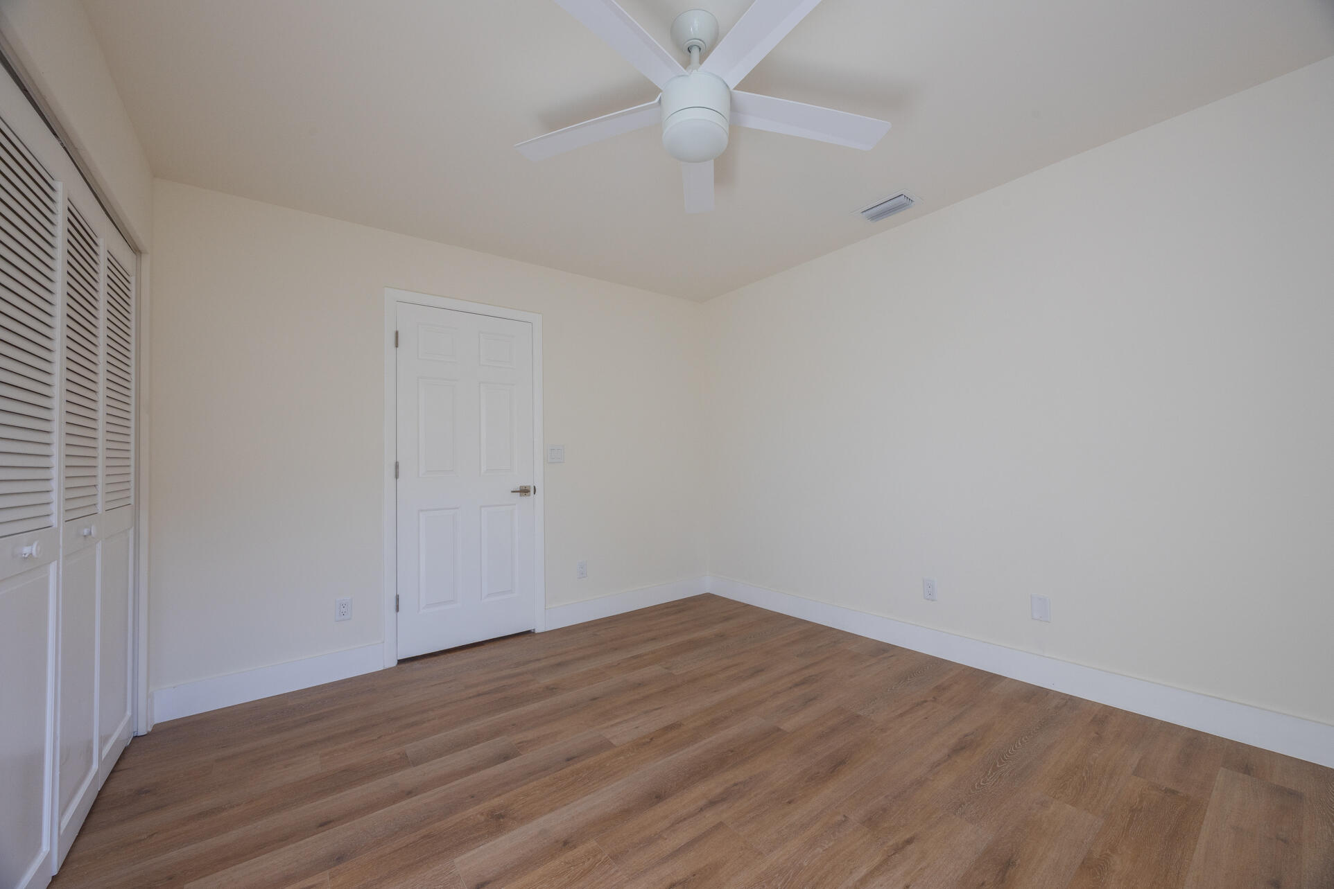 22352 Martella Avenue Boca Raton, FL 33433 - Photo 22 of 26 wooden floor in a room