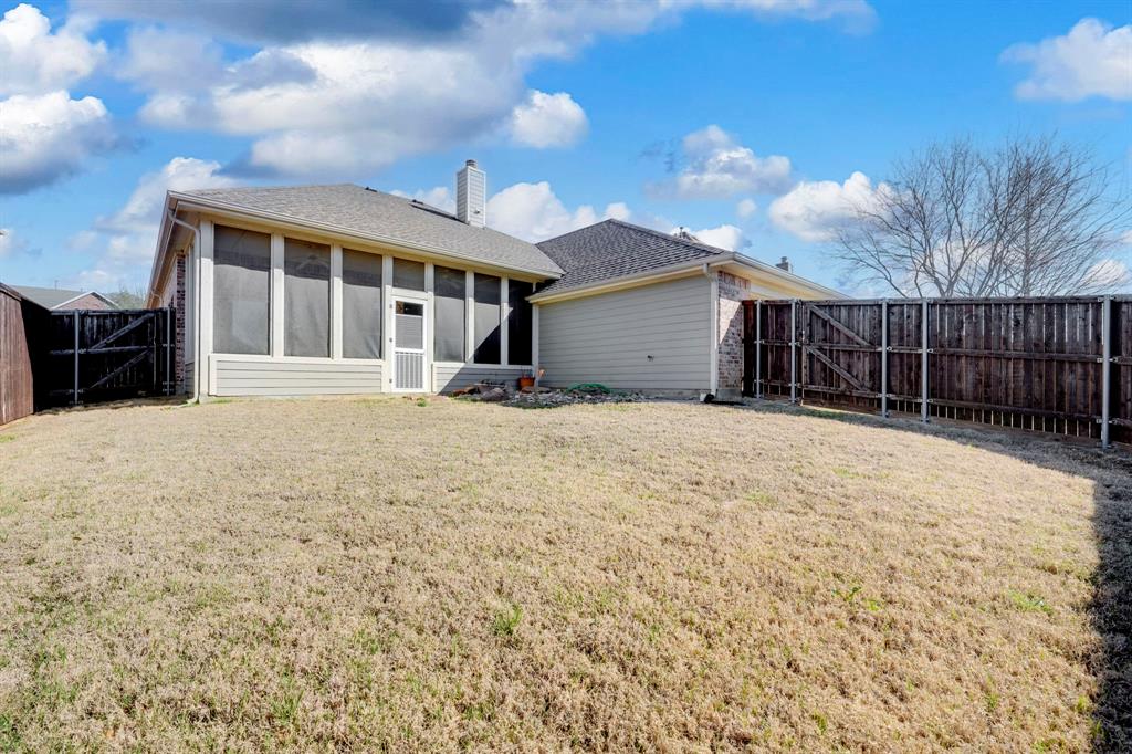 7519 Forest Ridge Trail Sachse, TX 75048 - Photo 35 of 35 a view of house with yard and balcony