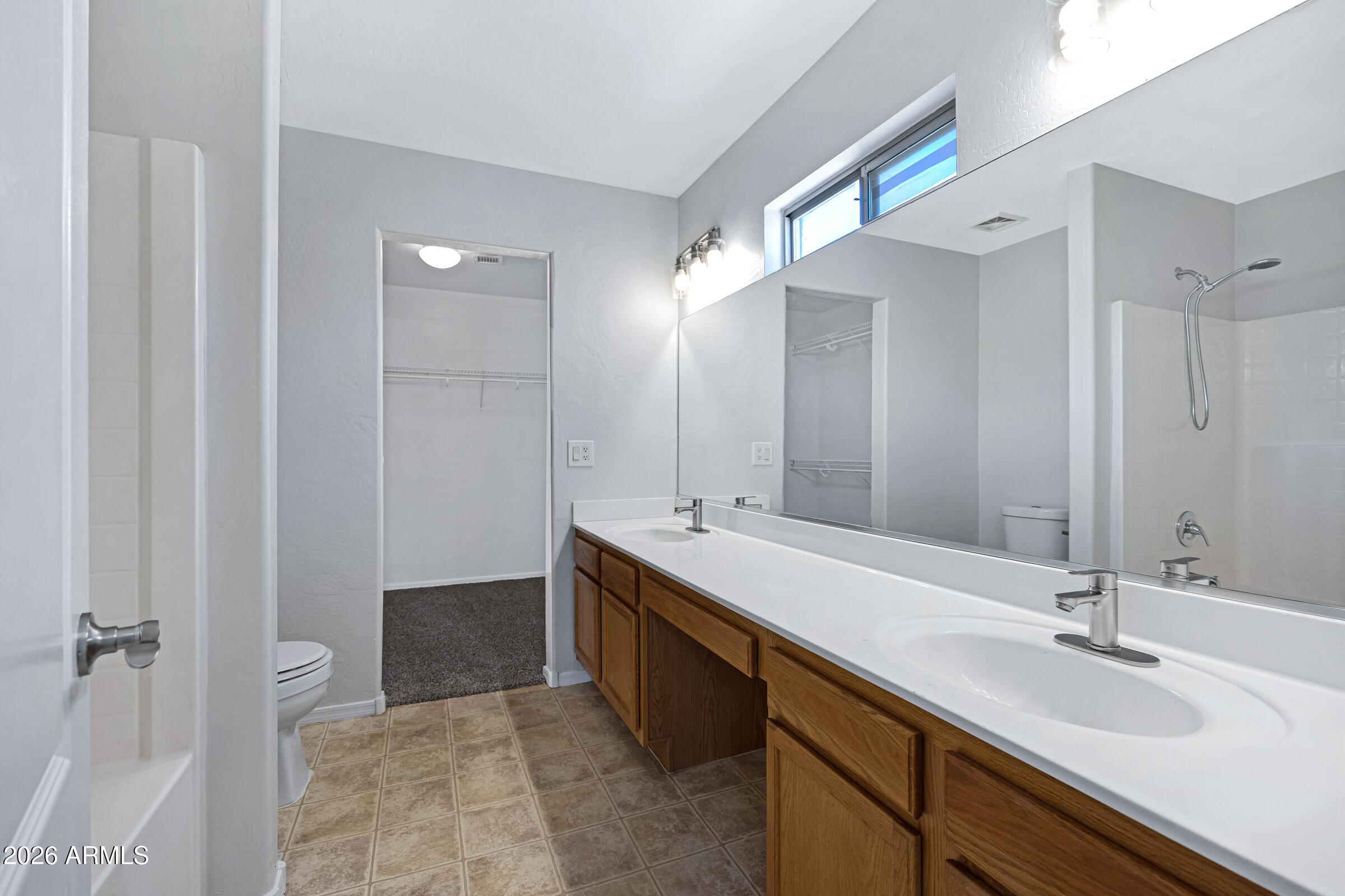 19408 North Braden Road Maricopa, AZ 85138 - Photo 35 of 51 a bathroom with a double vanity sink mirror and double