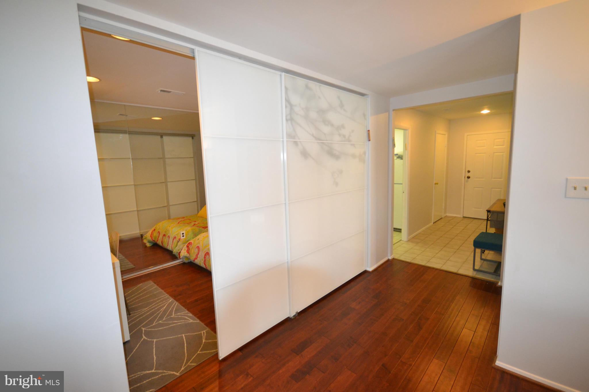 3011 Fallstaff Road, Unit 301A Baltimore, MD 21209 - Photo 7 of 25 a view of a room with wooden floor and bathroom