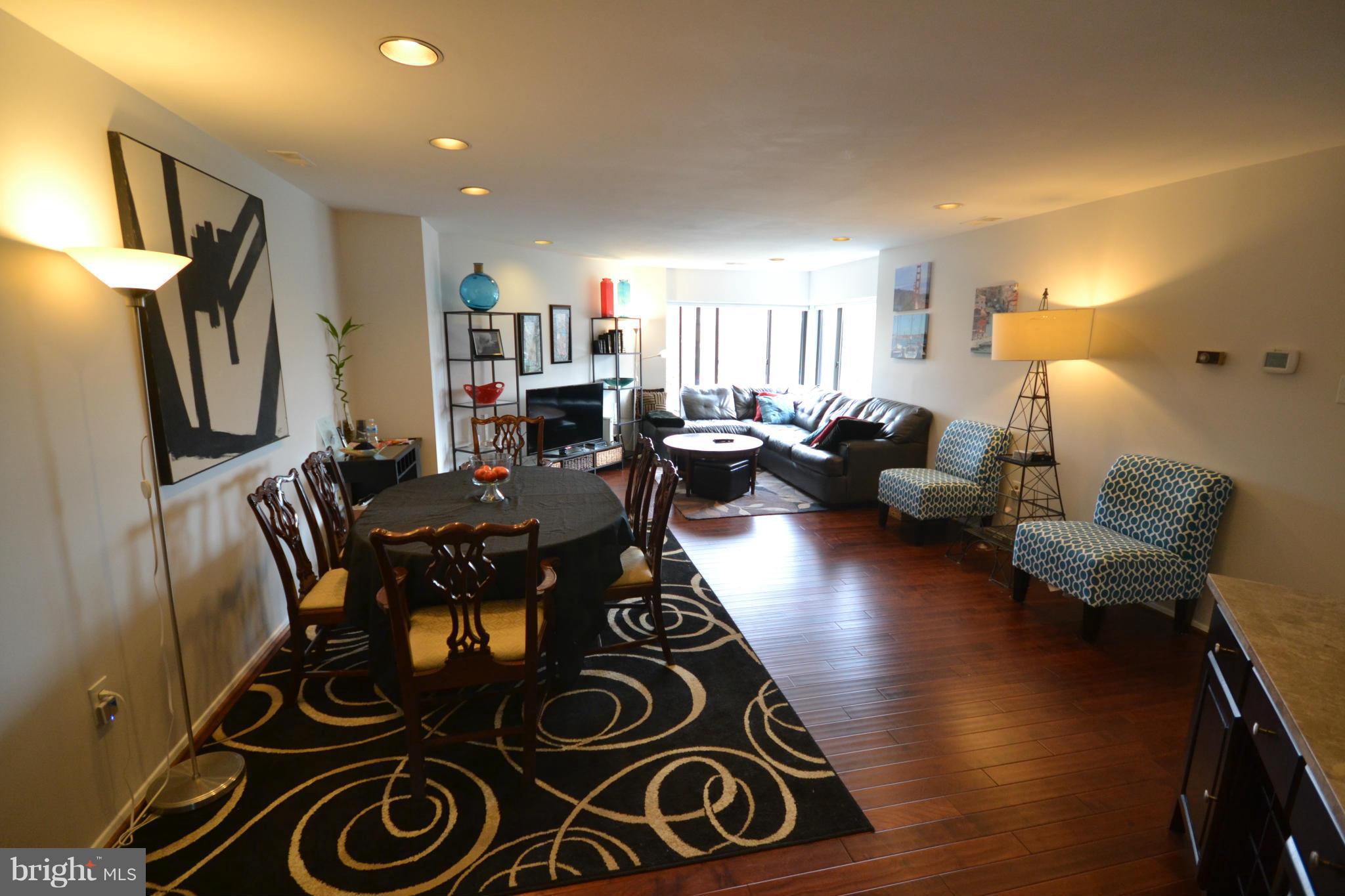 3011 Fallstaff Road, Unit 301A Baltimore, MD 21209 - Photo 9 of 25 a living room with furniture and a flat screen tv
