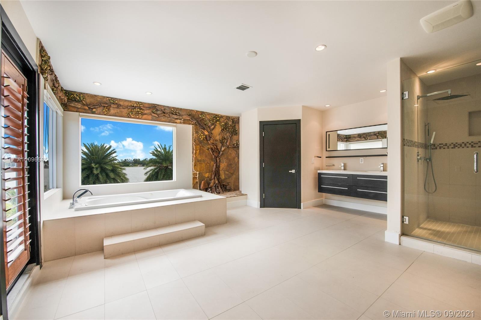 5131 Southwest 87th Avenue Miami, FL 33165 - Photo 11 of 24 a view of a kitchen with a sink and refrigerator