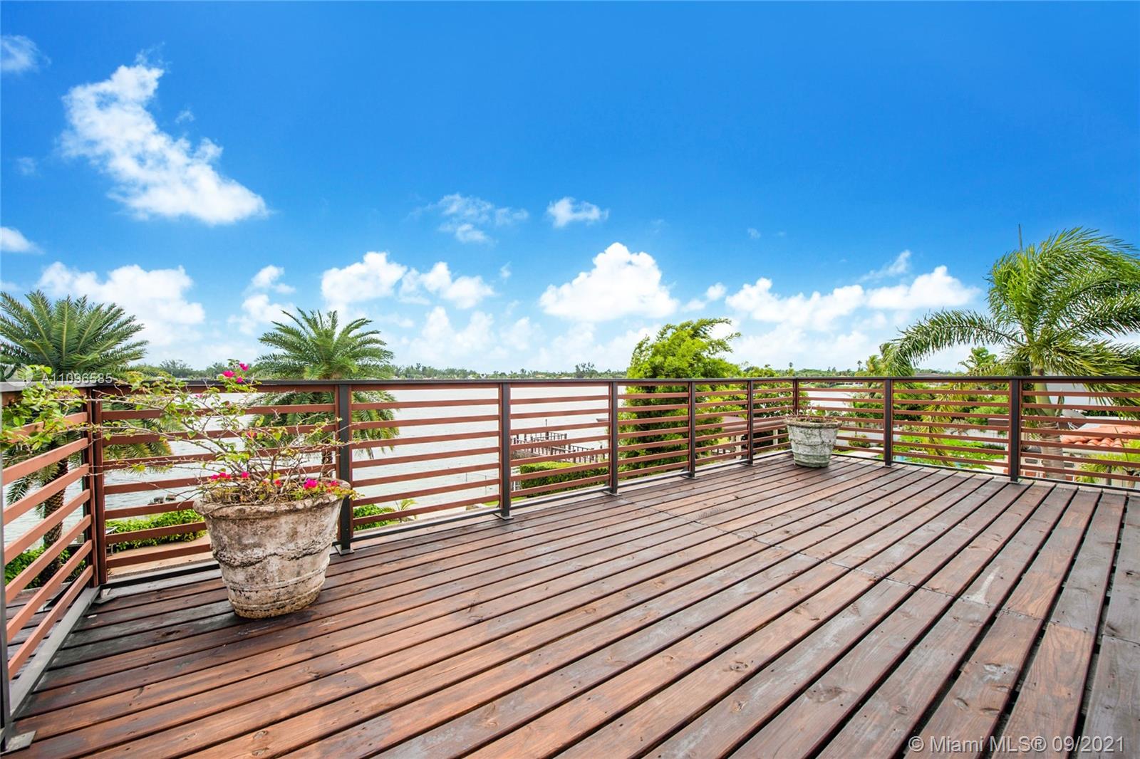 5131 Southwest 87th Avenue Miami, FL 33165 - Photo 13 of 24 a view of a balcony with wooden floor