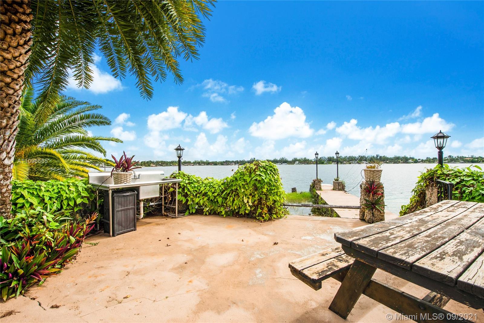 5131 Southwest 87th Avenue Miami, FL 33165 - Photo 23 of 24 a view of a terrace with chairs and a patio