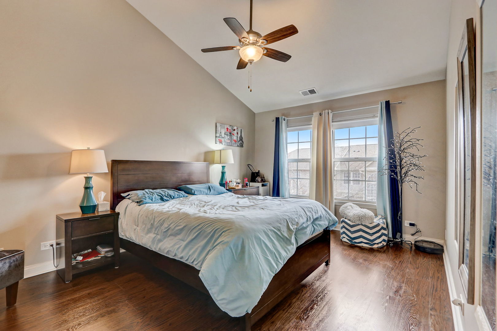 628 Village Road, Unit B Crystal Lake, IL 60014 - Photo 18 of 33 a bedroom with a bed and a chandelier