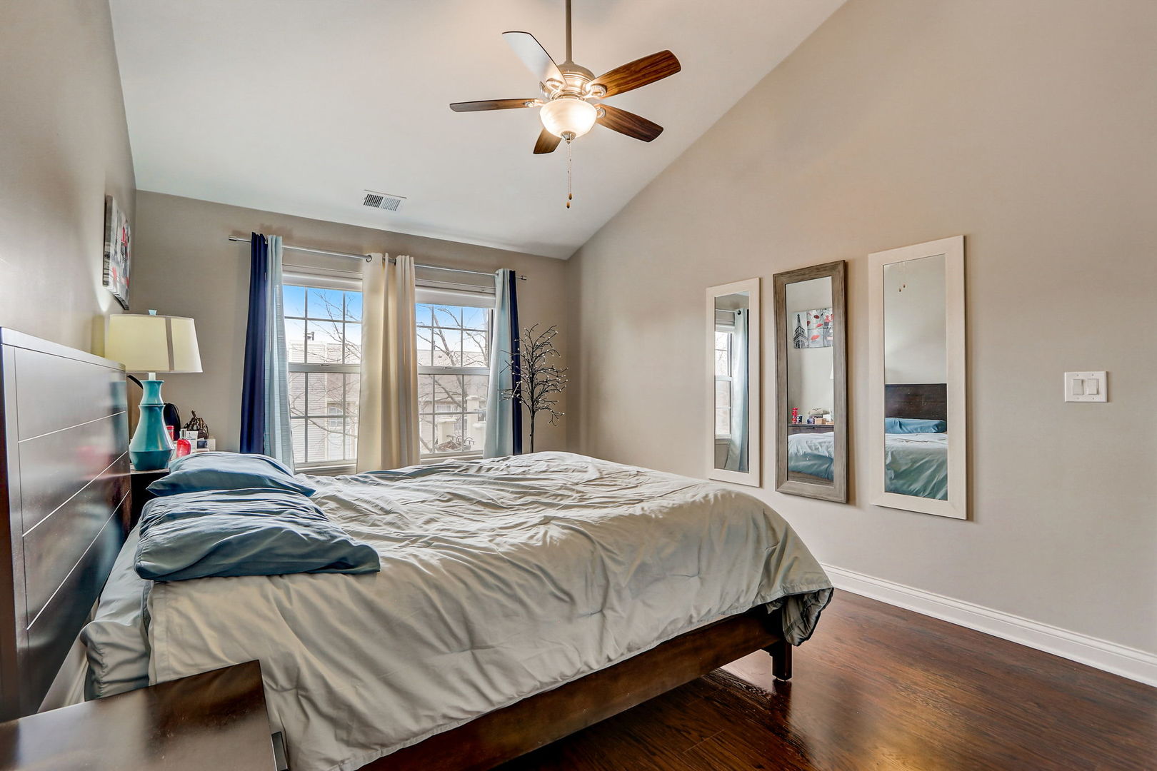 628 Village Road, Unit B Crystal Lake, IL 60014 - Photo 20 of 33 a bedroom with a bed and a large window
